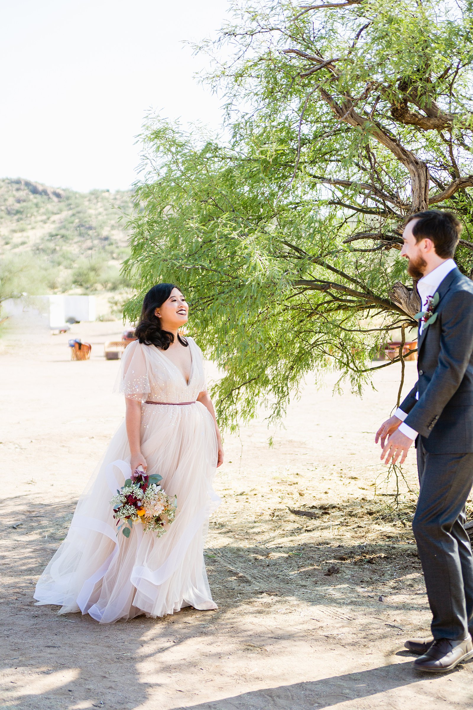 Bride and Groom's first look at Cloth and Flame Superstition Mountain by Phoenix wedding photographer PMA Photography.
