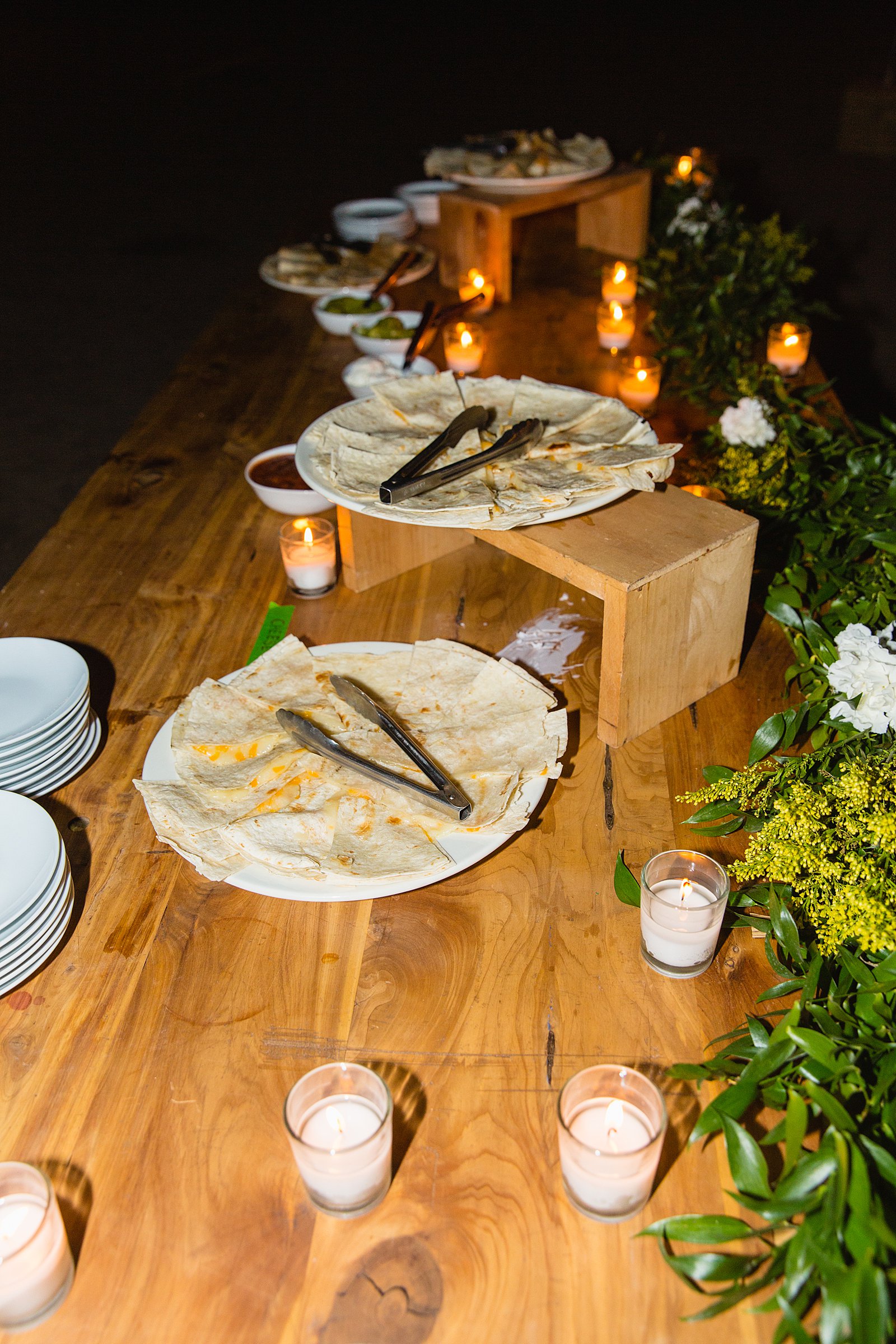 Late night snacks of quesadilla at a Cloth and Flame wedding reception by Phoenix wedding photographer PMA Photography.