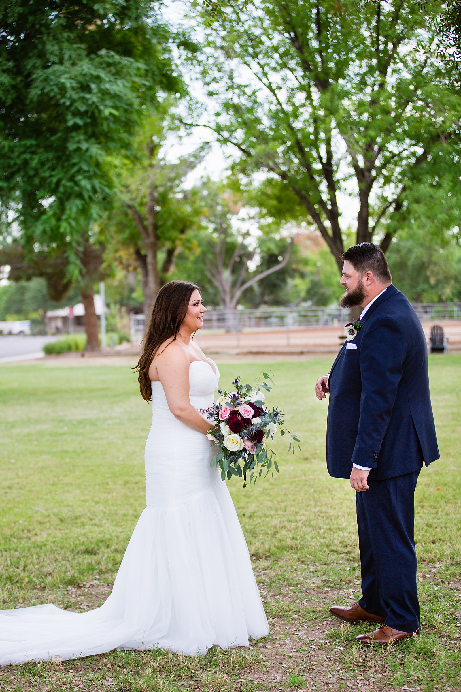 Bride and Groom's first look at Arizona backyard by Phoenix wedding photographer PMA Photography.