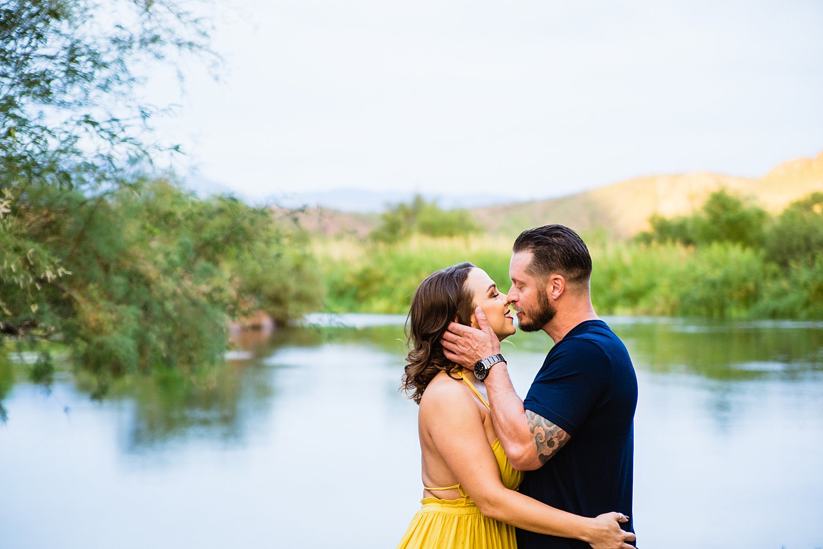 Couple share an intimate moment during their Salt River engagement session by Phoenix engagement photographer PMA Photography.