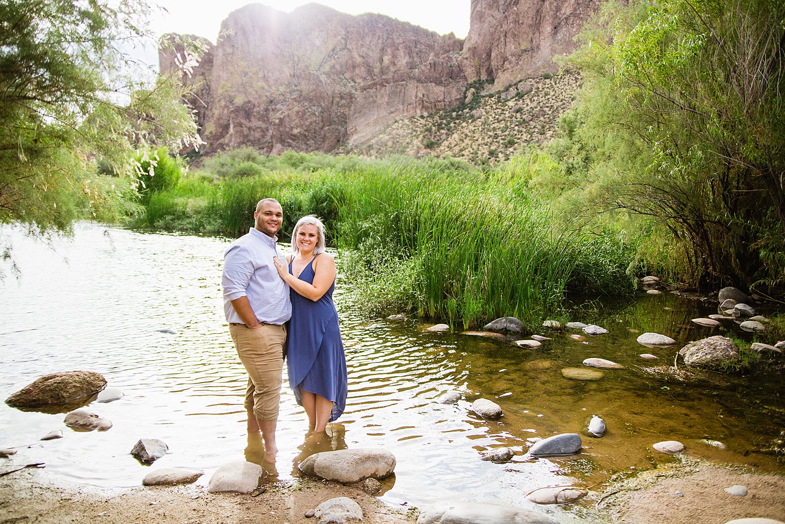 Adventurous couple pose for their Salt River engagement session by Phoenix wedding photographer PMA Photography.