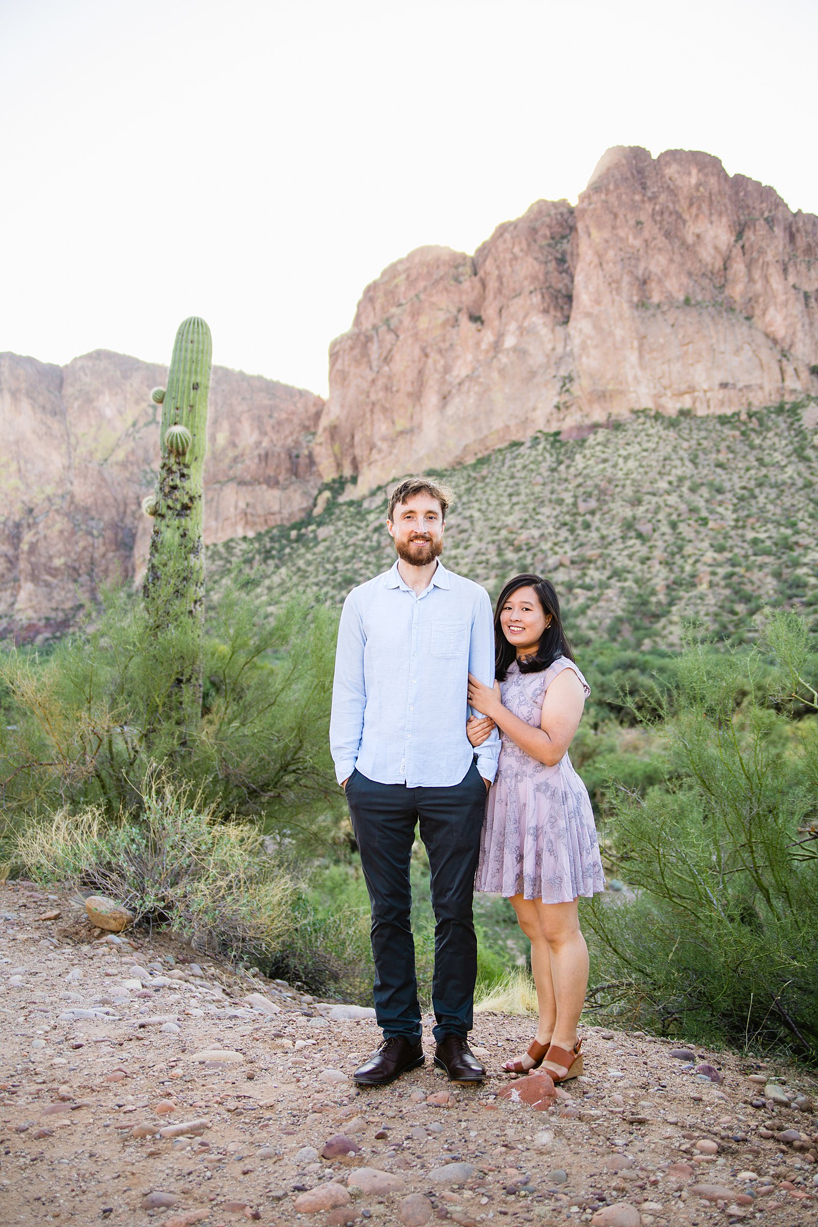 Couple pose for their Salt River engagement session by Phoenix wedding photographer PMA Photography.