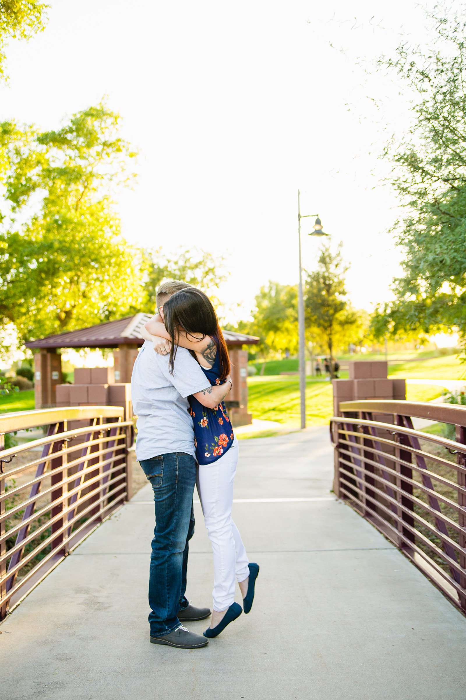Surprise engagement session during an Anthem Park couples session by Phoenix wedding photographer PMA Photography.