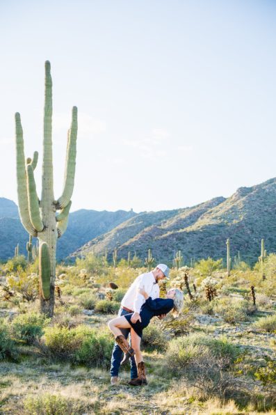 Couple dance together during their White Tanks engagement session by Phoenix engagement photographer PMA Photography.