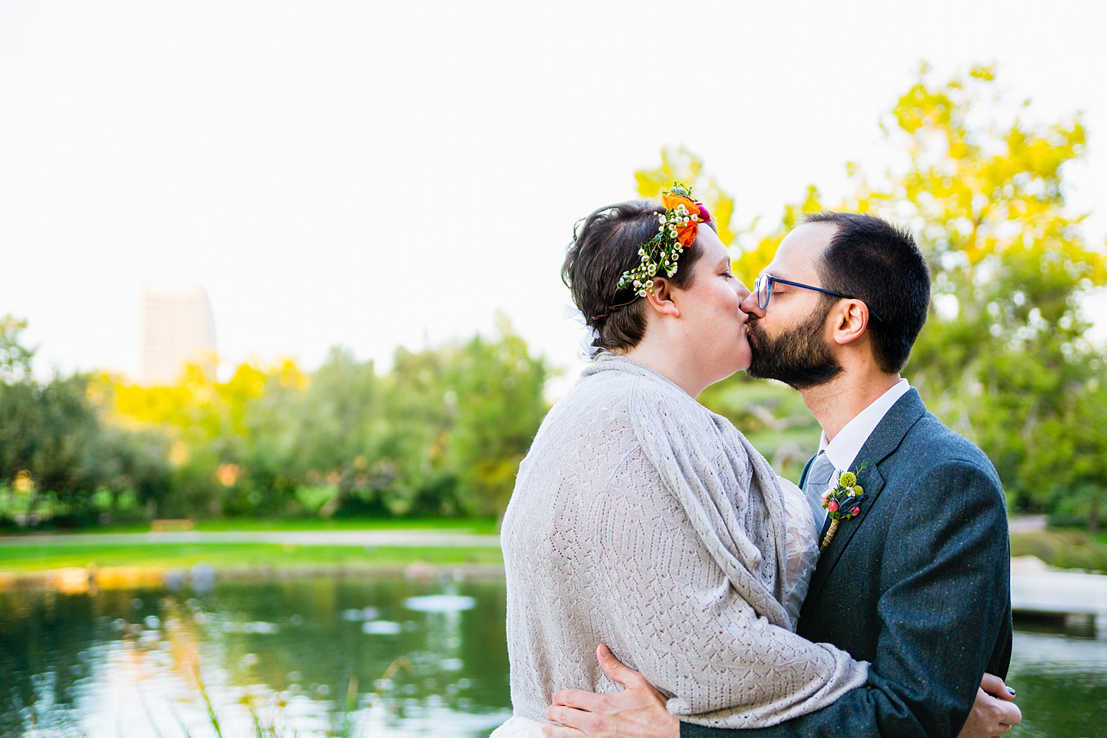 Bride and Groom share a kiss during their Japanese Friendship Garden wedding by Phoenix wedding photographer PMA Photography.