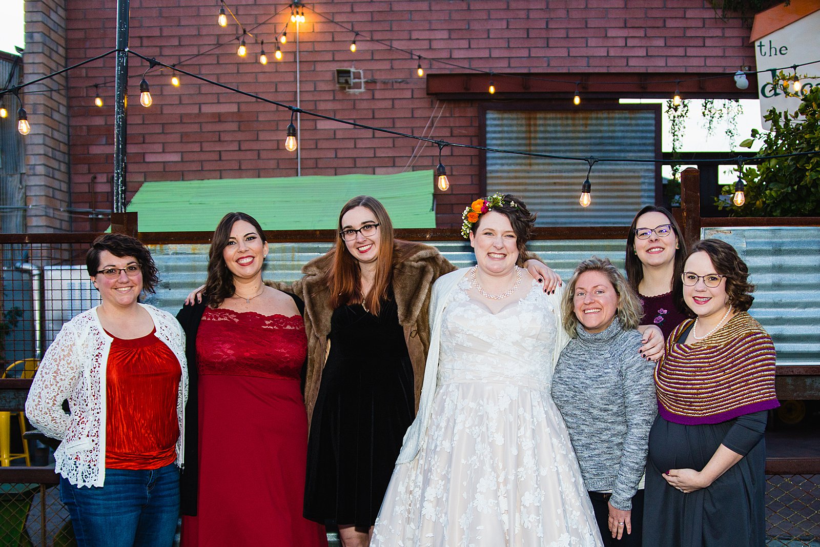 Bride and bridesmaids together at a The Duce wedding by Arizona wedding photographer PMA Photography.