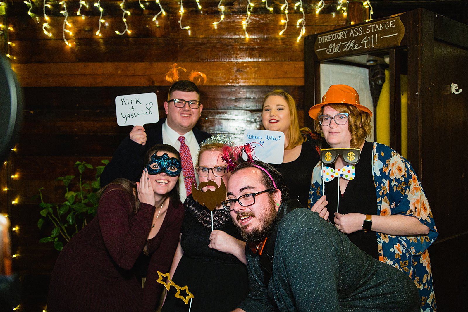 Guests in a DIY photo booth together at a low key wedding reception at The Duce by PMA Photography.