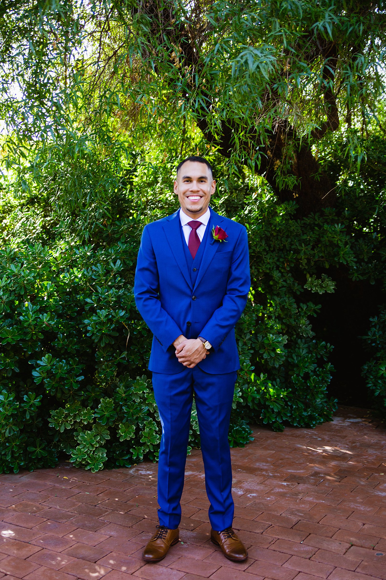 Groom's blue suit for his Valley Garden Center wedding by PMA Photography.