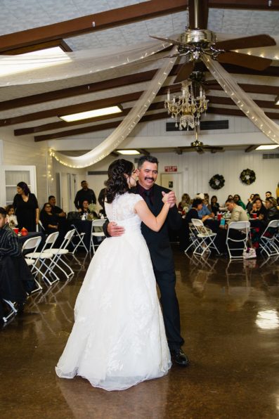 Father daughter dance at their Valley Garden Center wedding reception by Arizona wedding photographer PMA Photography.