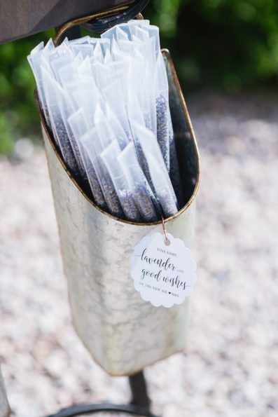 Lavender toss tubes for a wedding ceremony at The Paseo by Arizona wedding photographers PMA Photography.