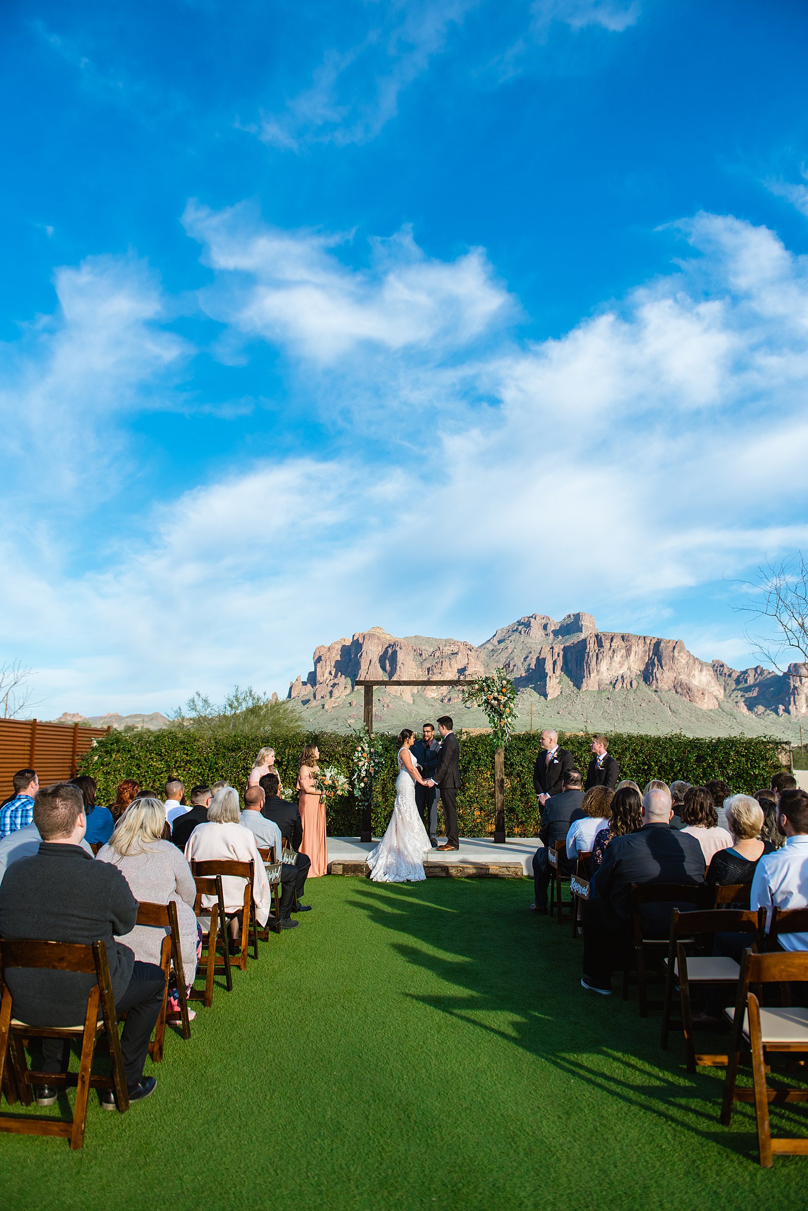 Wedding ceremony at The Paseo by Phoenix wedding photographer PMA Photography.