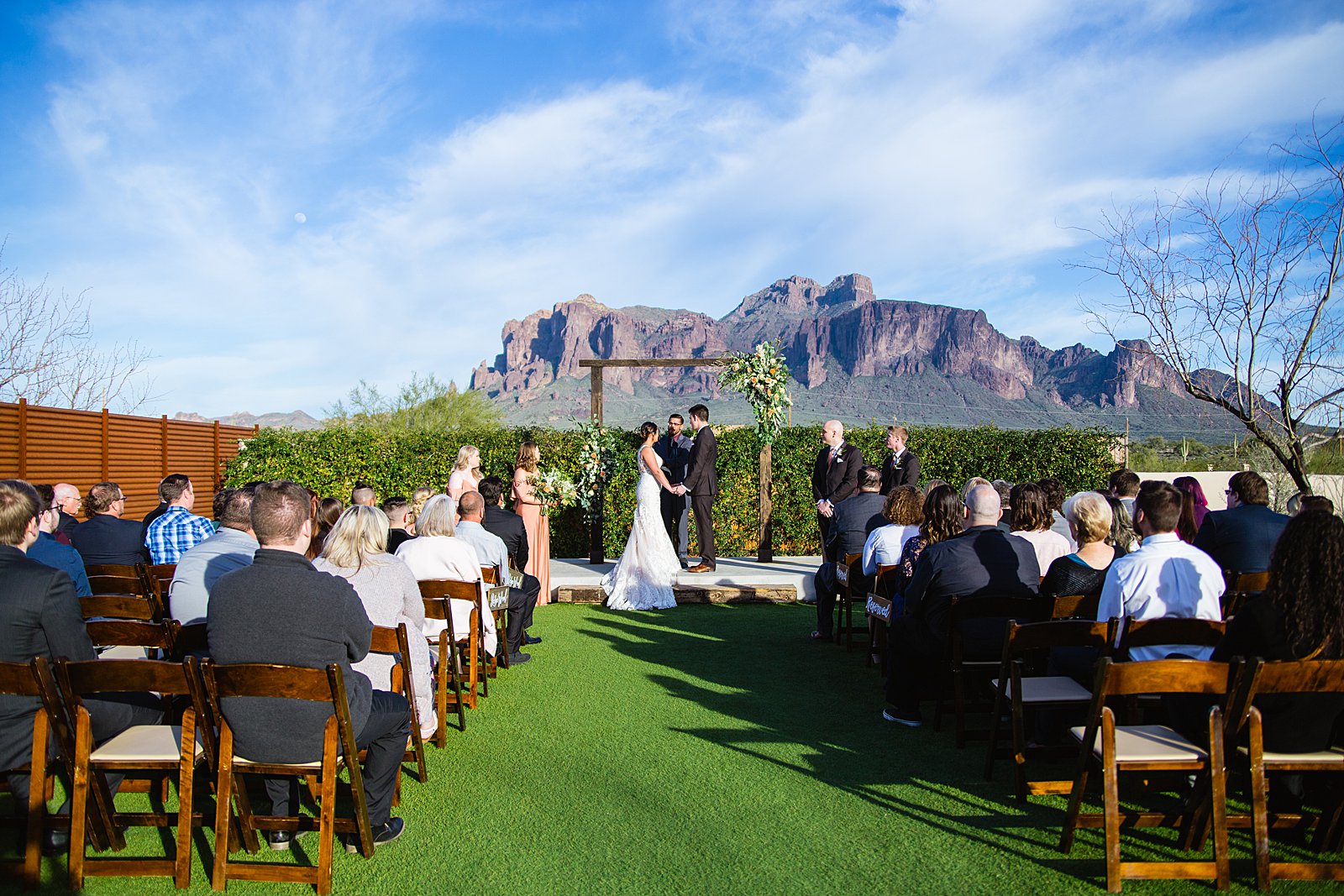 Wedding ceremony at The Paseo by Phoenix wedding photographer PMA Photography.