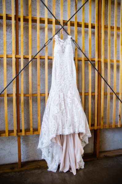 Bride's romantic peach lace wedding dress for her The Paseo wedding by PMA Photography.