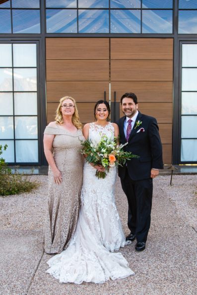 Family photos during The Paseo wedding by Arizona wedding photographer PMA Photography.