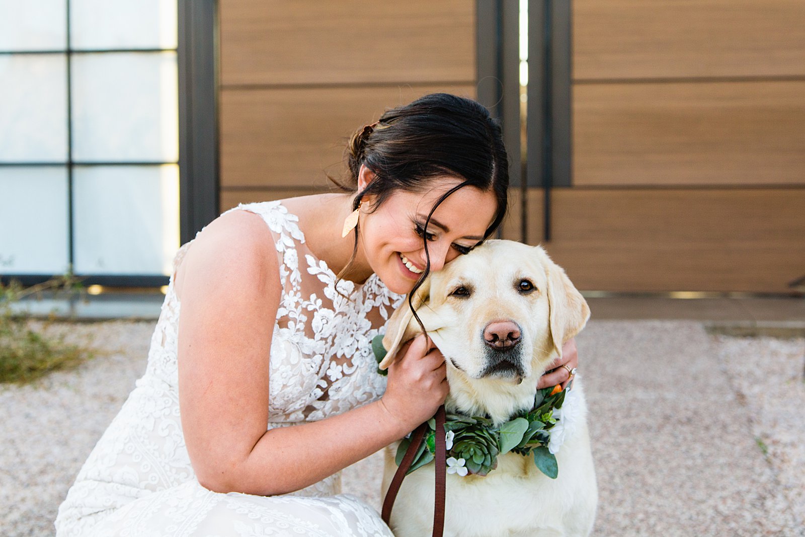 Bride cuddling with her pup on her wedding day at The Paseo wedding by Arizona wedding photographer PMA Photography.
