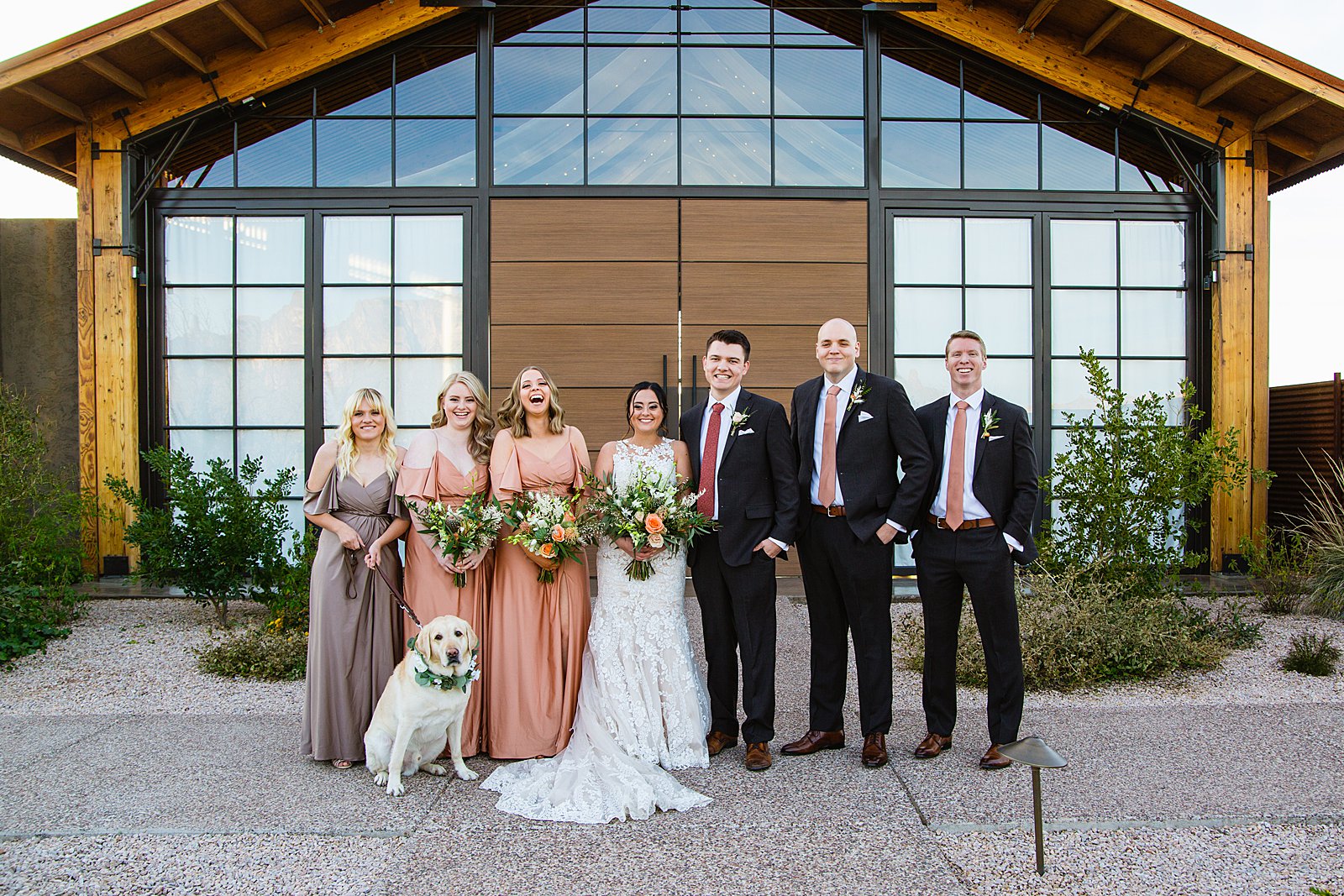 Bridal party together at a The Paseo wedding by Arizona wedding photographer PMA Photography.