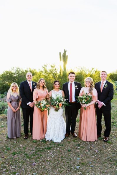 Bridal party together at a The Paseo wedding by Arizona wedding photographer PMA Photography.