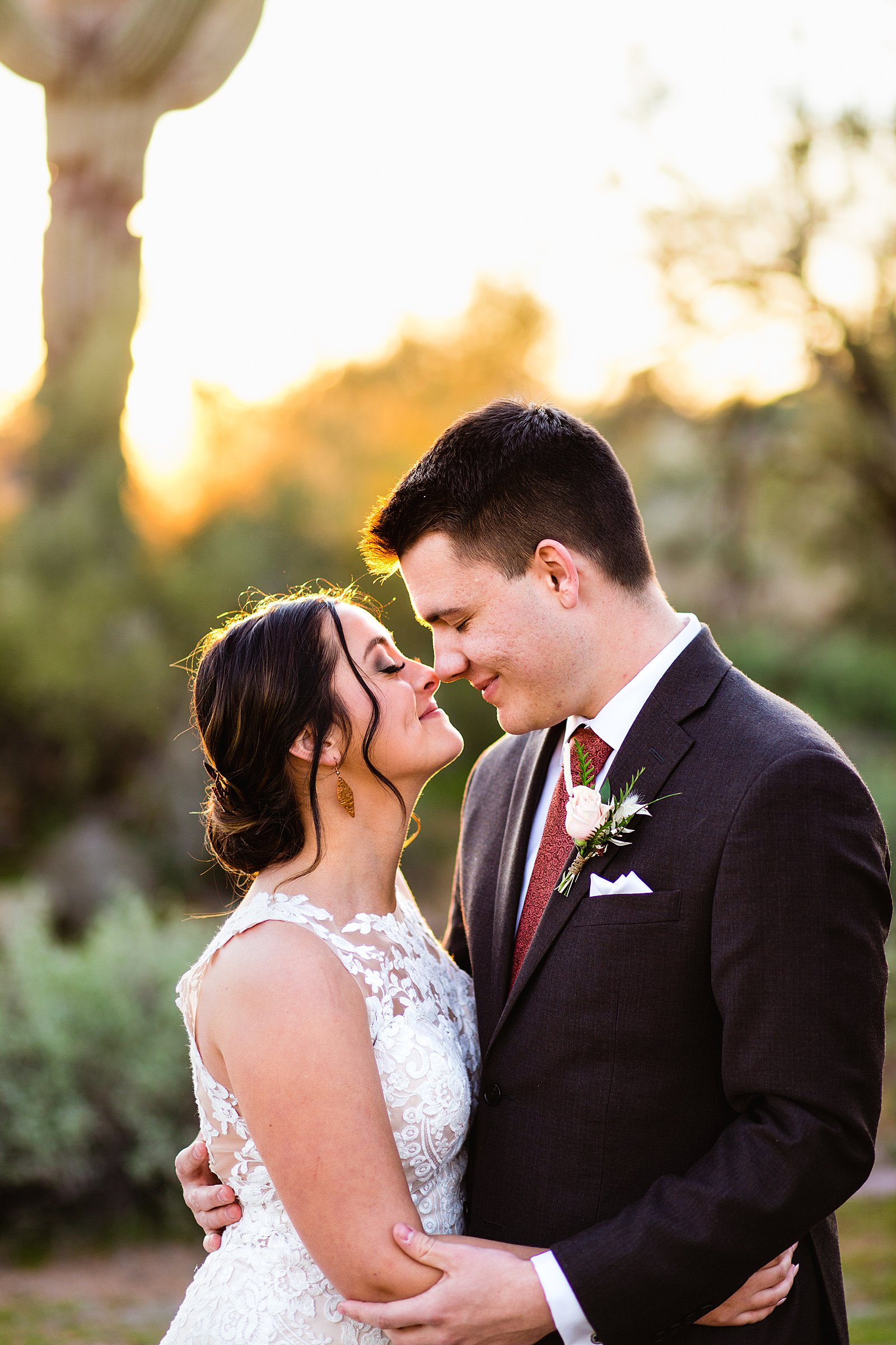 Bride and Groom share an intimate moment during their The Paseo wedding by Apache Junction wedding photographer PMA Photography.