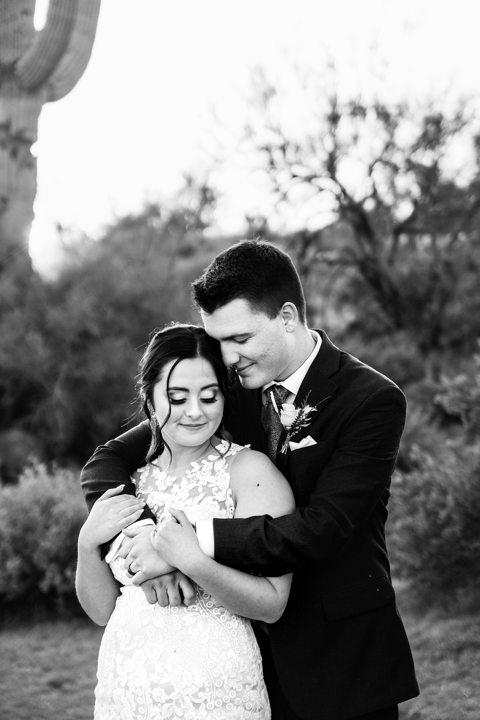Bride and Groom share an intimate moment at their The Paseo wedding by Arizona wedding photographer PMA Photography.