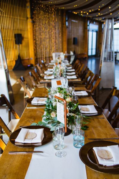 Modern rustic wedding reception at The Paseo by Phoenix wedding photographer PMA Photography.