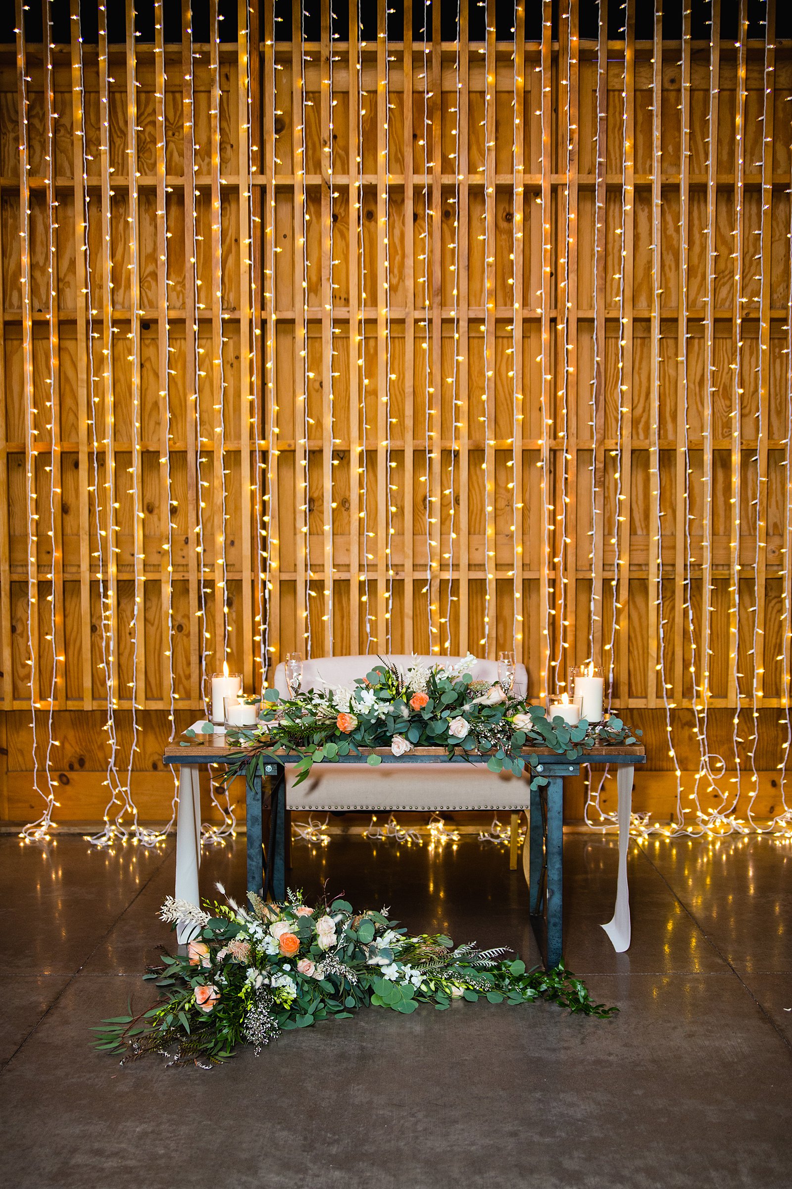 Sweetheart table at The Paseo wedding reception by Arizona wedding photographer PMA Photography.