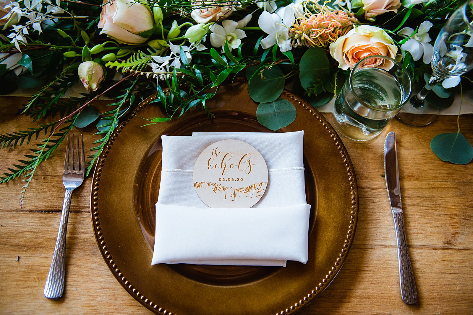 Custom wooden favors with an image of the superstition mountains table reception decorations at The Paseo wedding reception by Apache Junction wedding photographer PMA Photography.