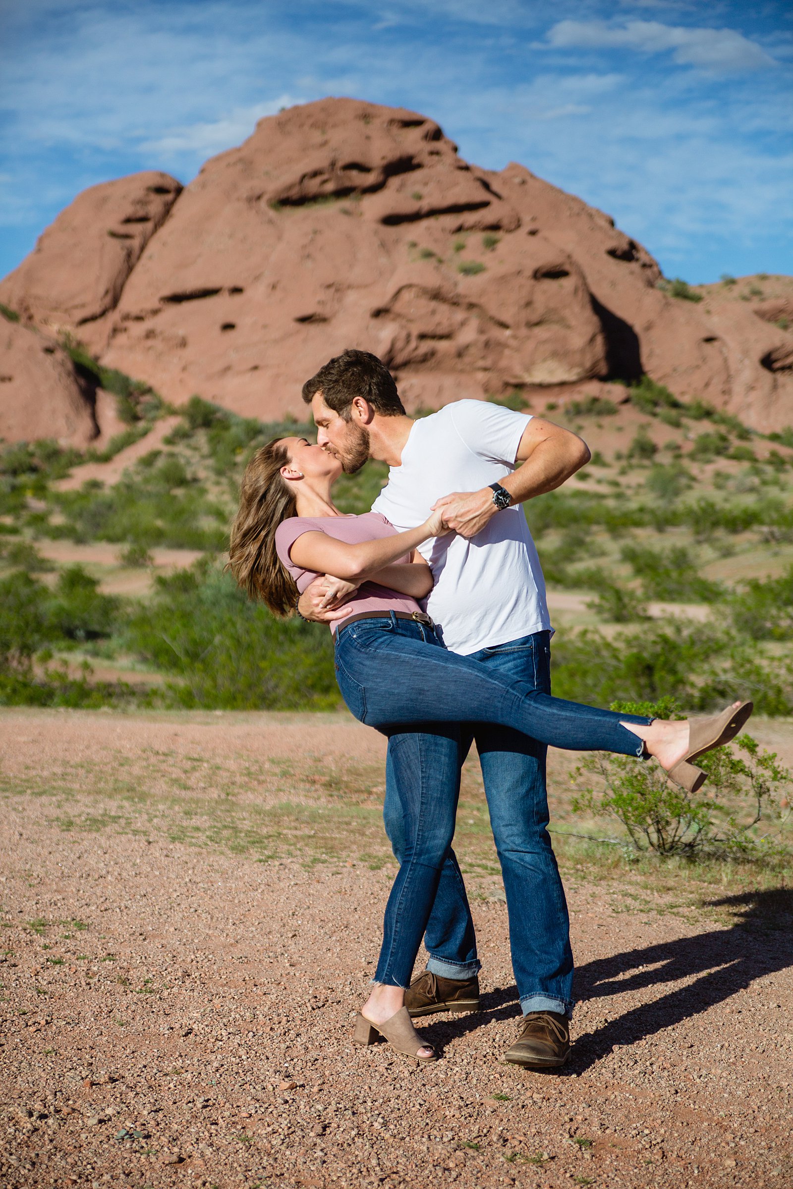 Couple practicing their first dance during their Phoenix engagement session by Arizona wedding photographer PMA Photography.