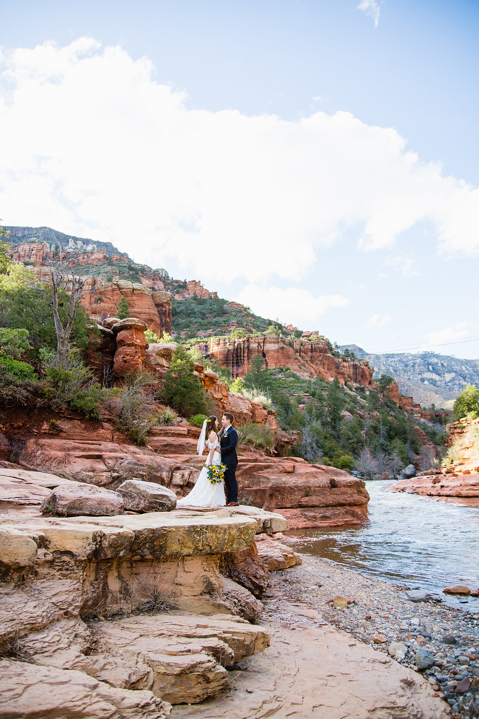 Bride and Groom share an intimate moment during their Slide Rock elopement by Sedona elopement photographer PMA Photography.
