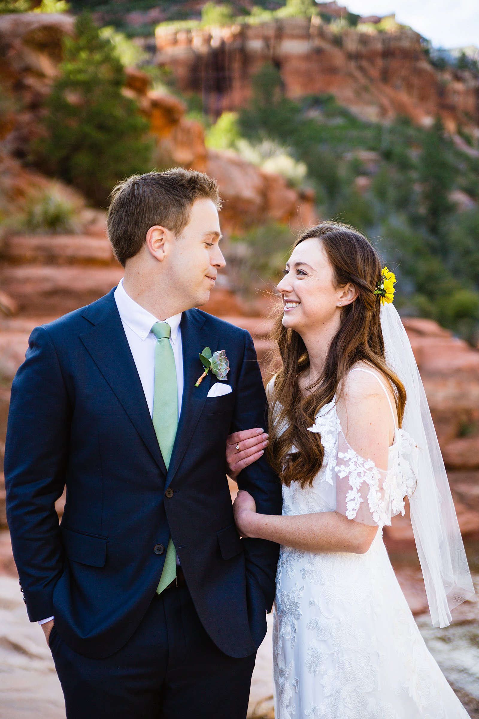 Bride and Groom share an intimate moment during their Slide Rock elopement by Sedona elopement photographer PMA Photography.