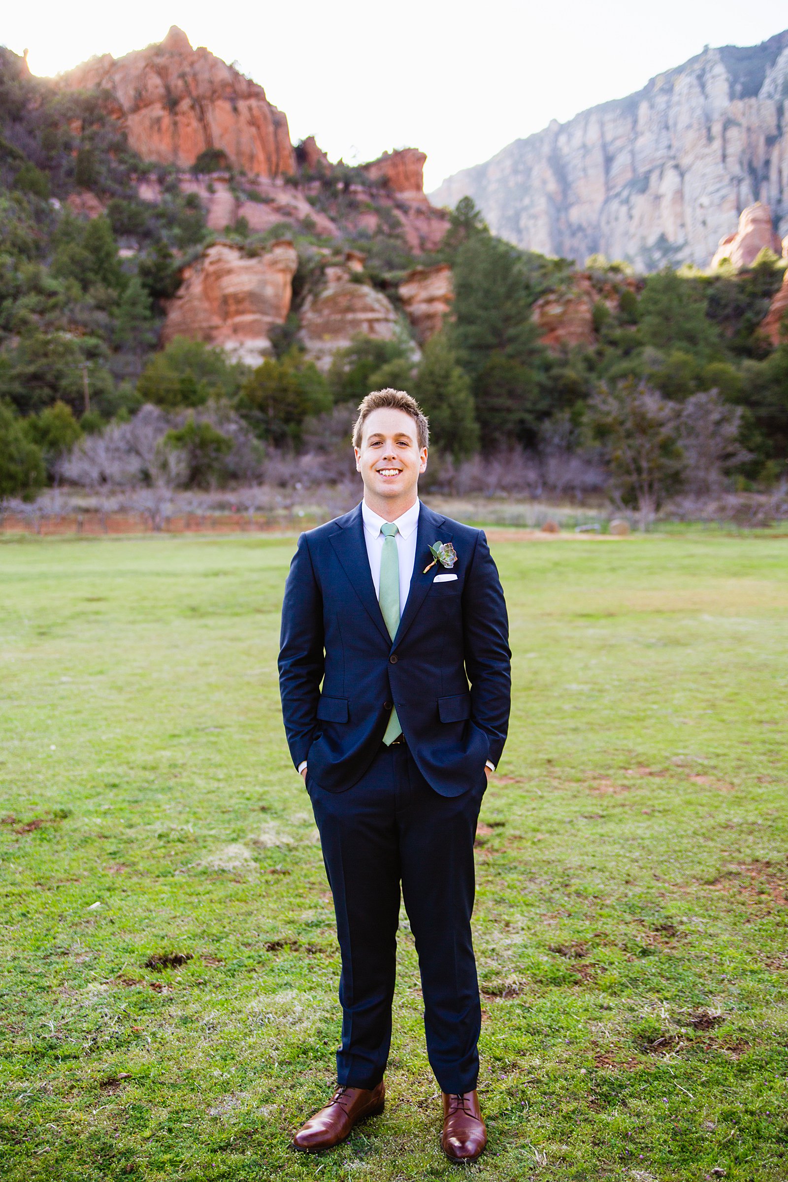Groom's navy suit for his Slide Rock elopement by PMA Photography.