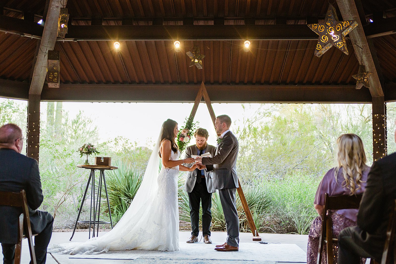 Wedding ceremony at Desert Botanical Gardens by Phoenix wedding photographer PMA Photography.