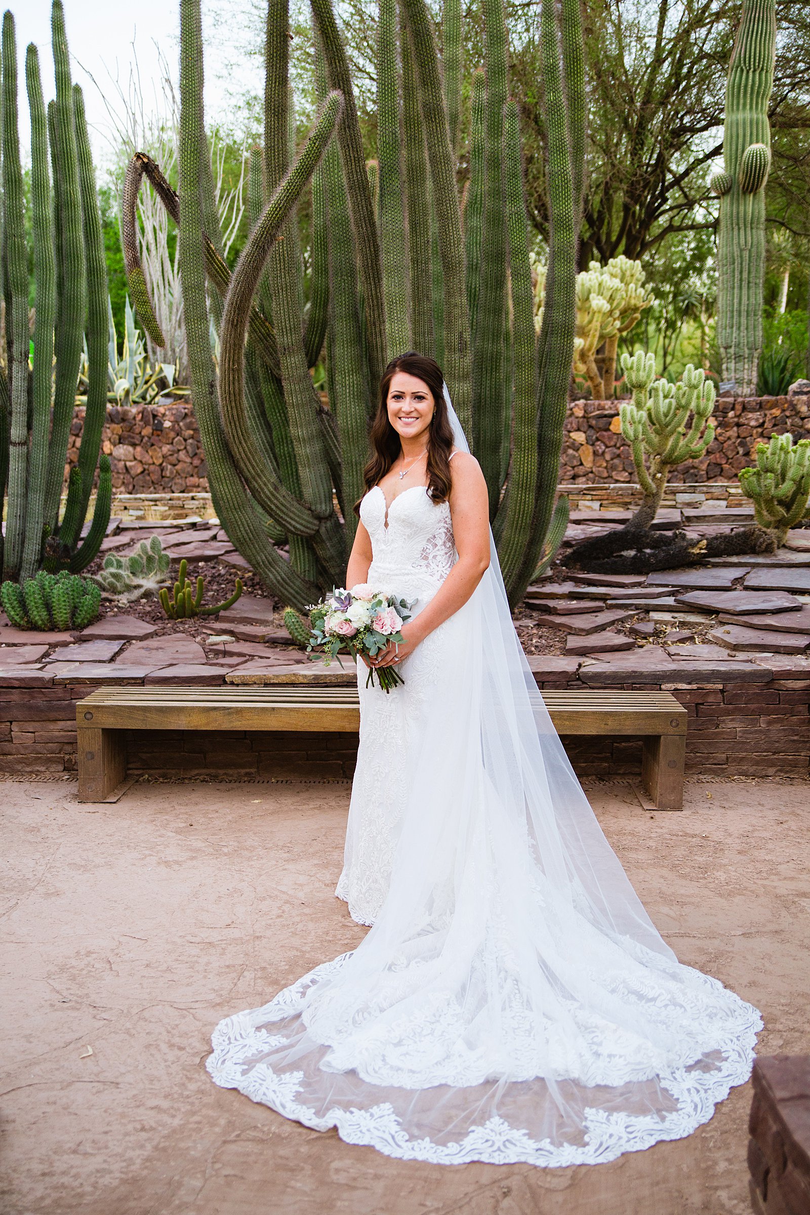 Bride's romantic lace wedding dress by PMA Photography.