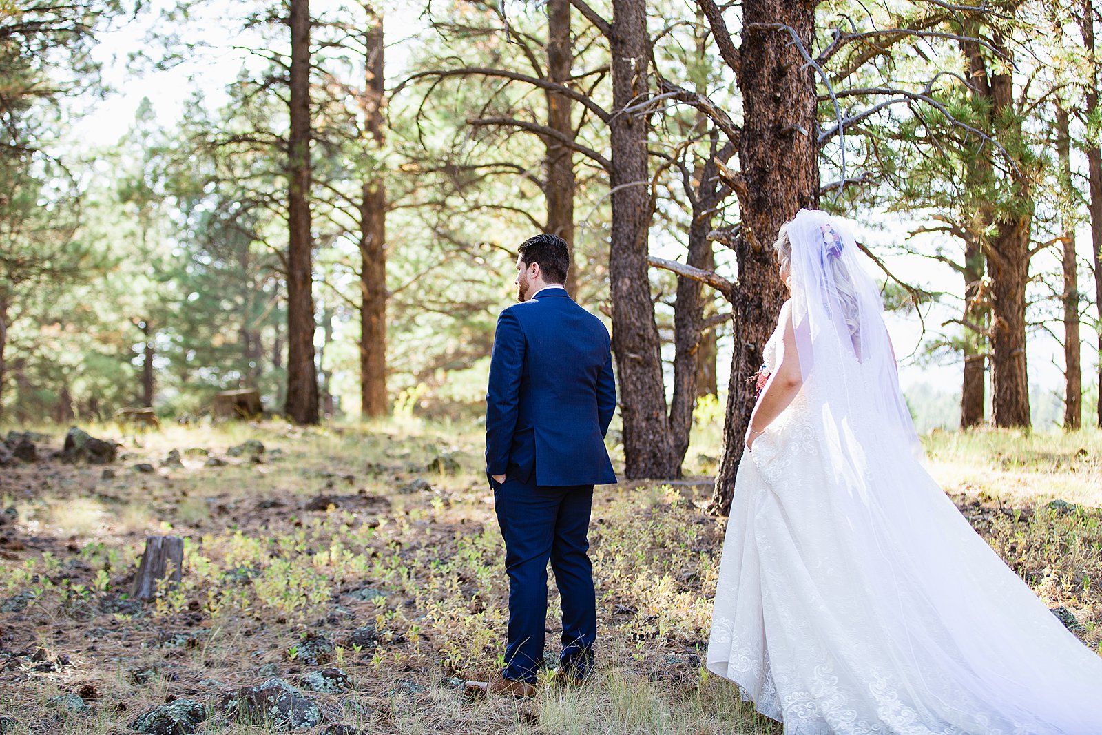 Bride and Groom's first look at Chapel of the Holy Dove by Arizona wedding photographer PMA Photography.