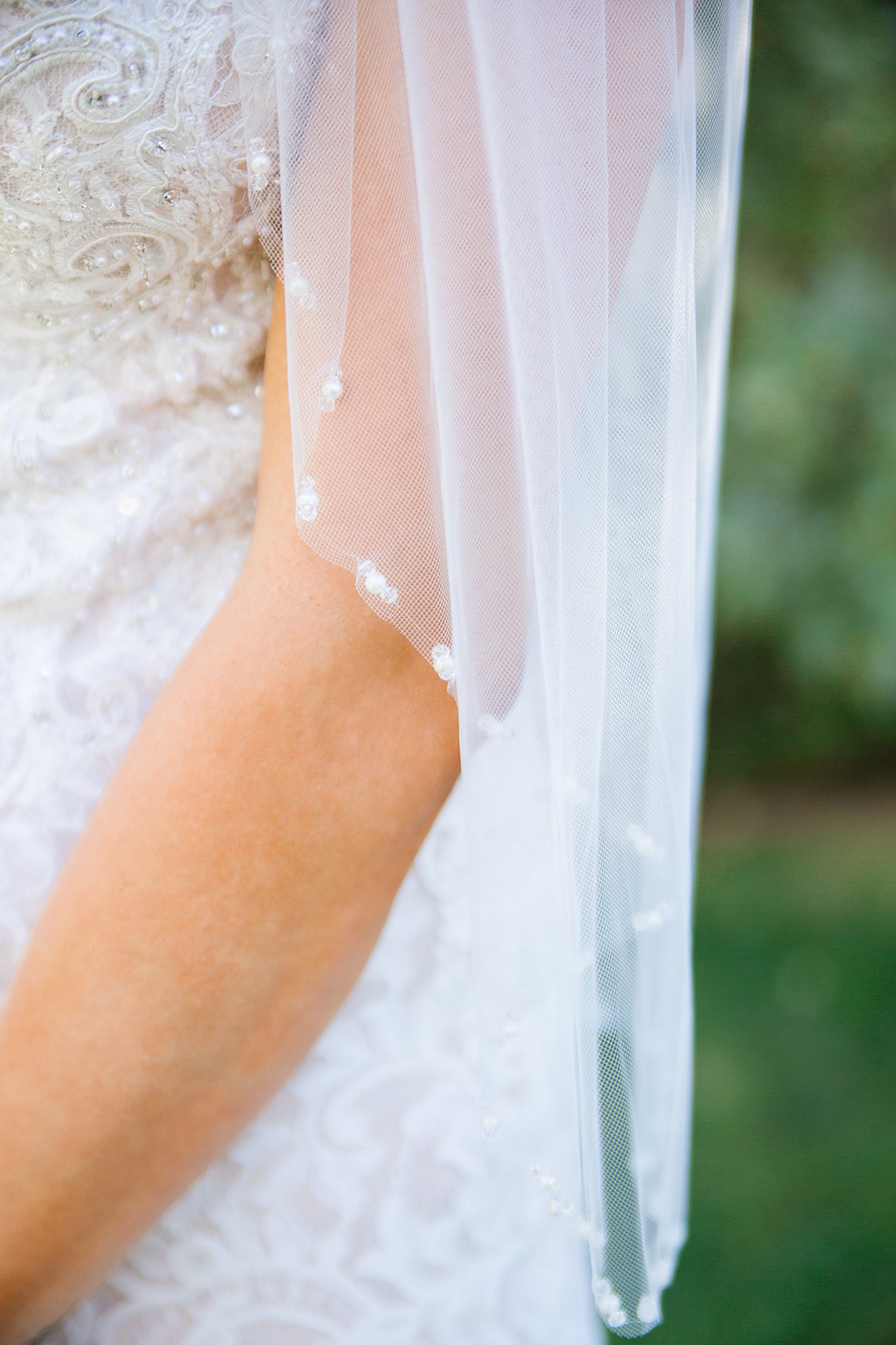 Detail of bride's veil by PMA Photography.