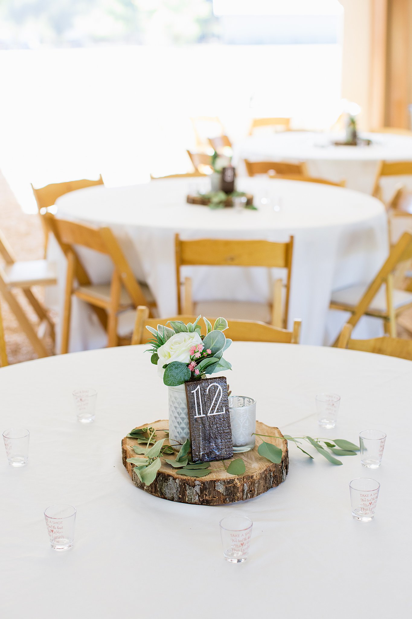 Simple, rustic centerpieces at Van Dickson Ranch wedding reception by Skull Valley wedding photographer PMA Photography.