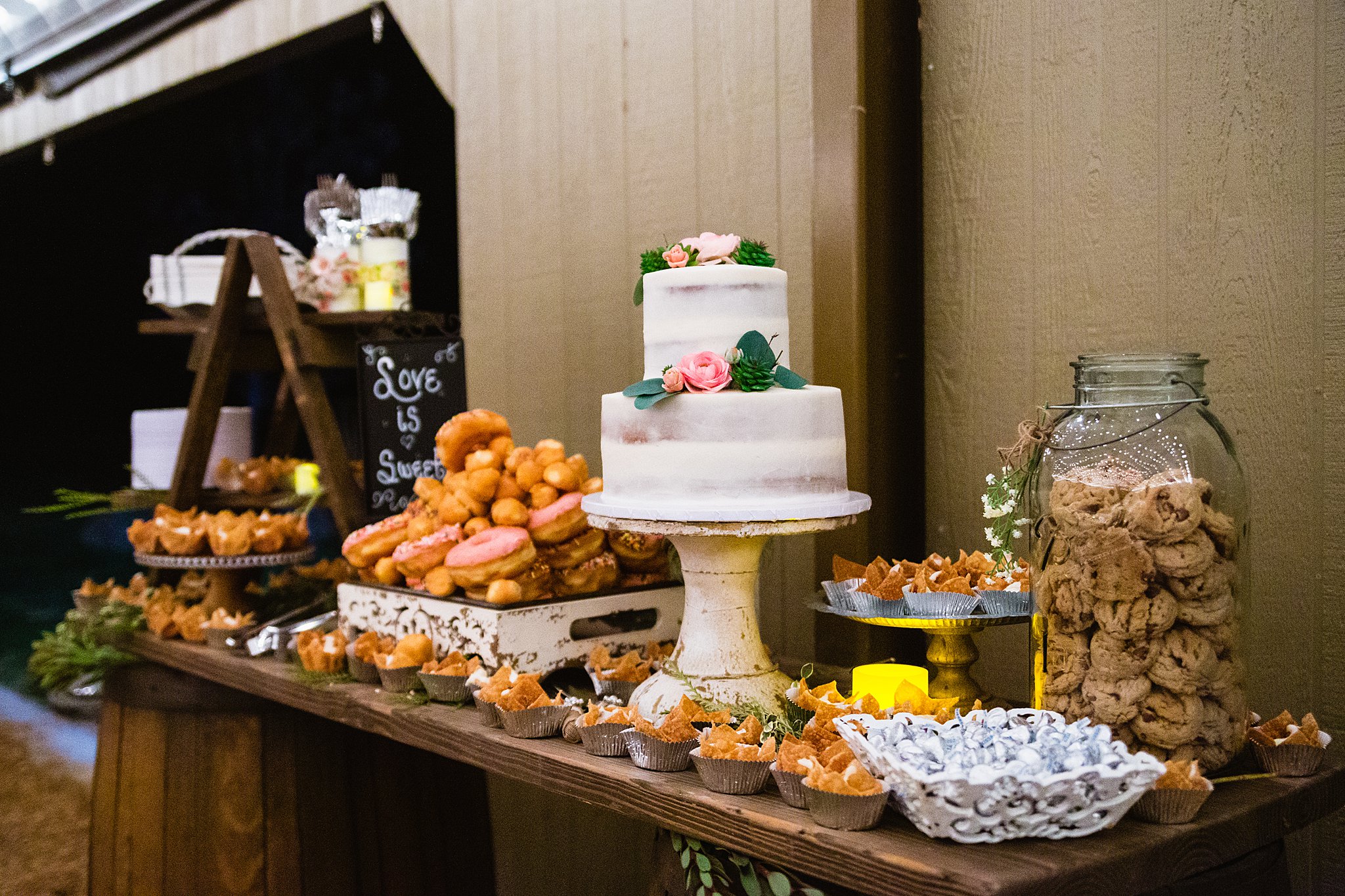 Cake and dessert table at Van Dickson Ranch wedding reception by Arizona wedding photographer PMA Photography.