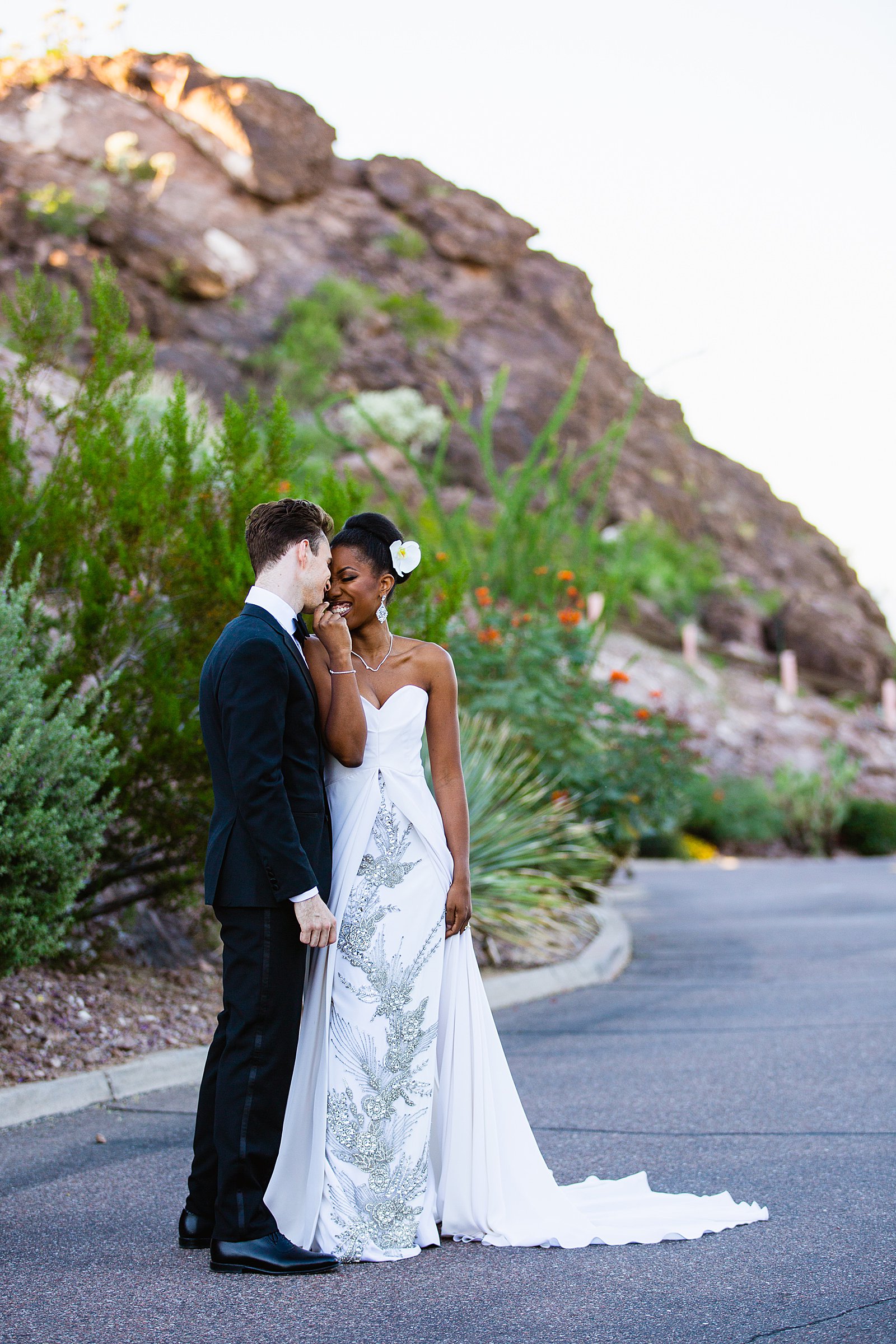 Bride and Groom pose for their multicultural wedding by Phoenix wedding photographer PMA Photography.