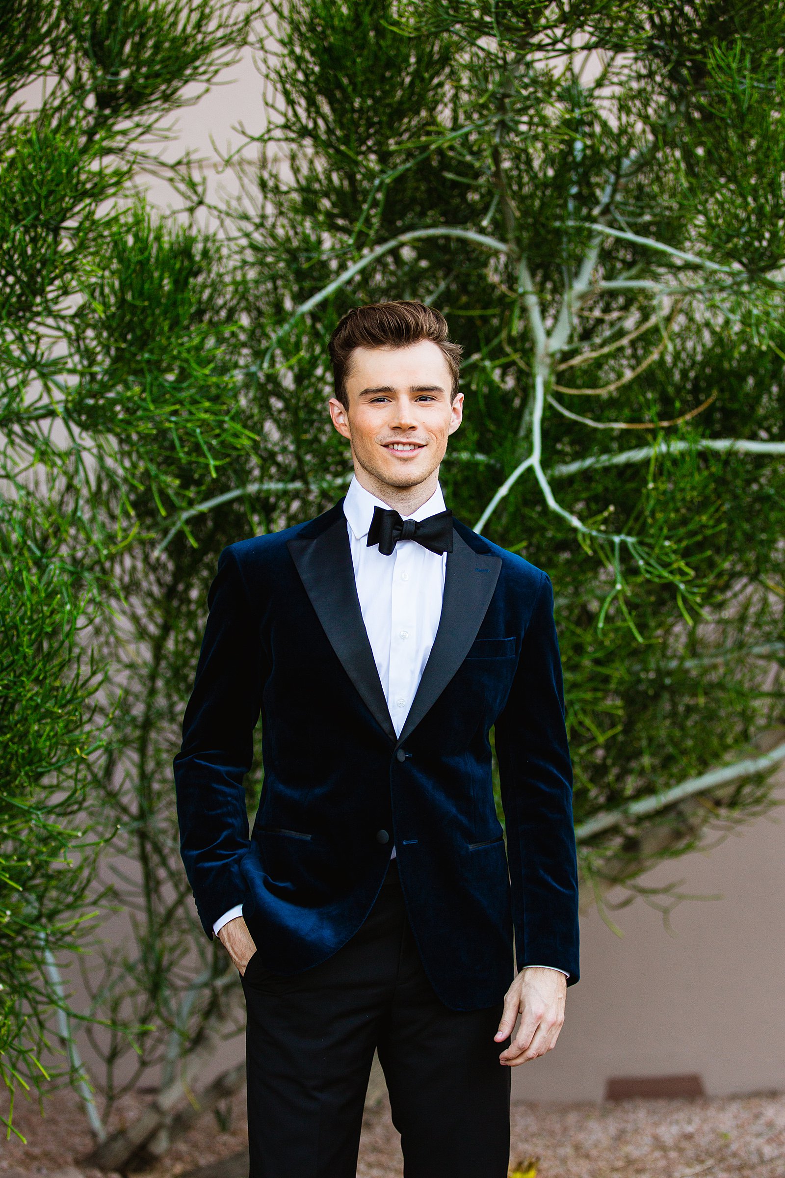 Groom in a navy velvet tux for his multicultural wedding by Phoenix wedding photographer PMA Photography.