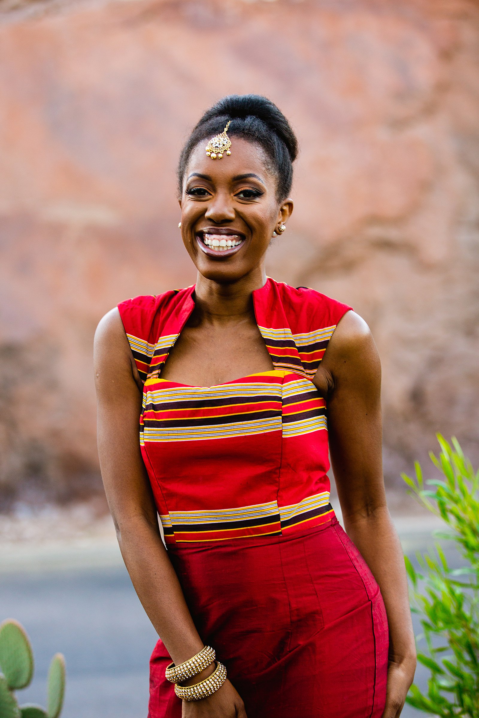 Bride's Ugandan Red Kitenge and Raw Silk Dress for her multicultural wedding by Phoenix wedding photographer PMA Photography.