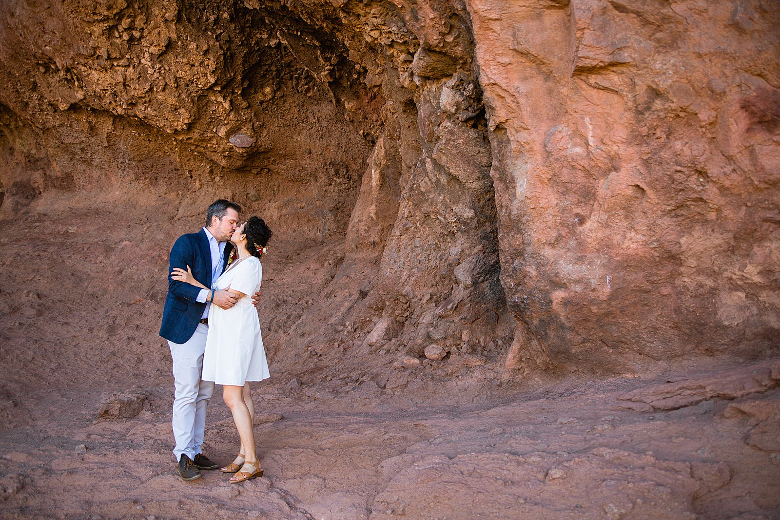 Bride and Groom share a kiss during their Papago Park elopement by Arizona elopement photographer PMA Photography.