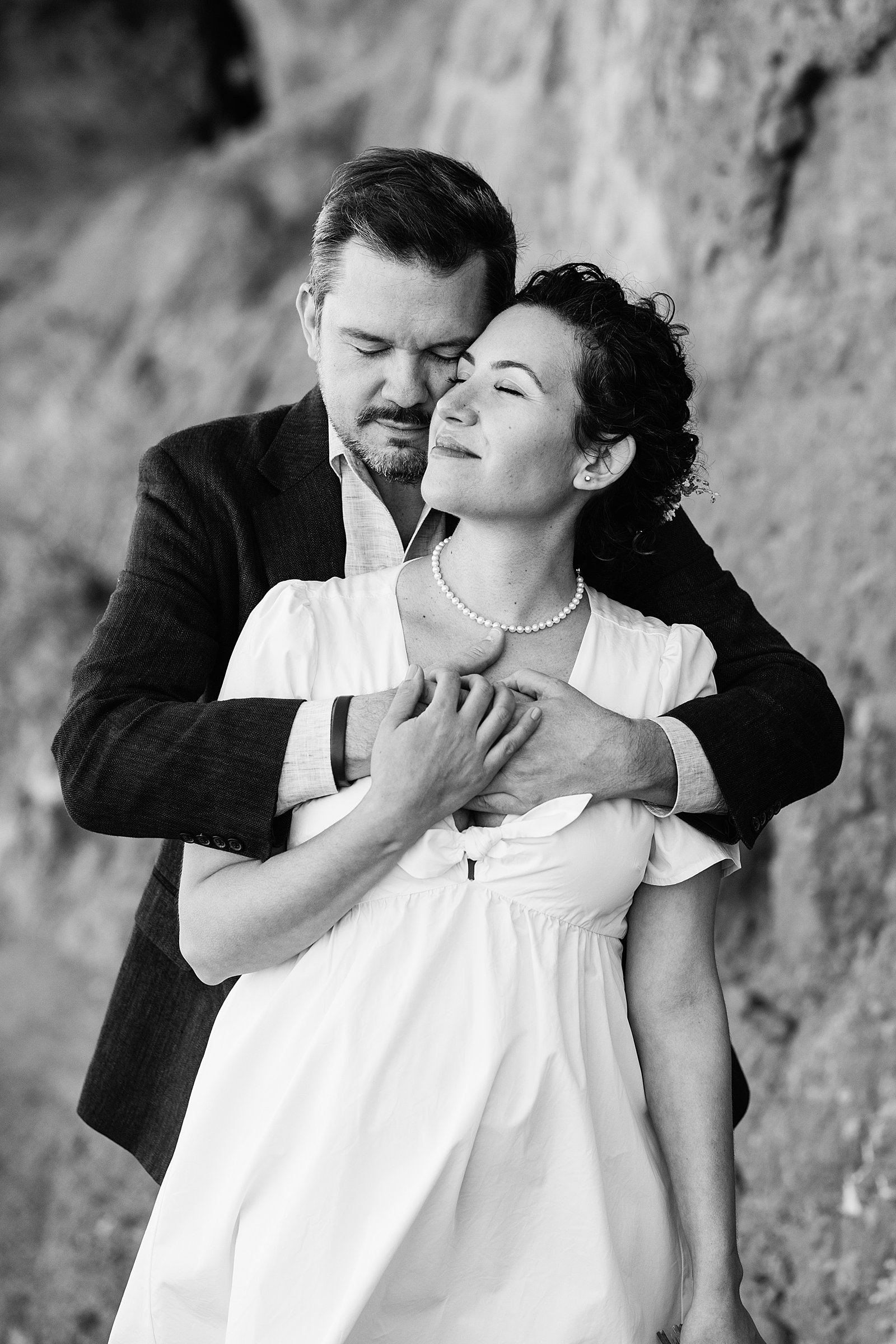 Bride and Groom share an intimate moment at their Papago Park elopement by Arizona elopement photographer PMA Photography.