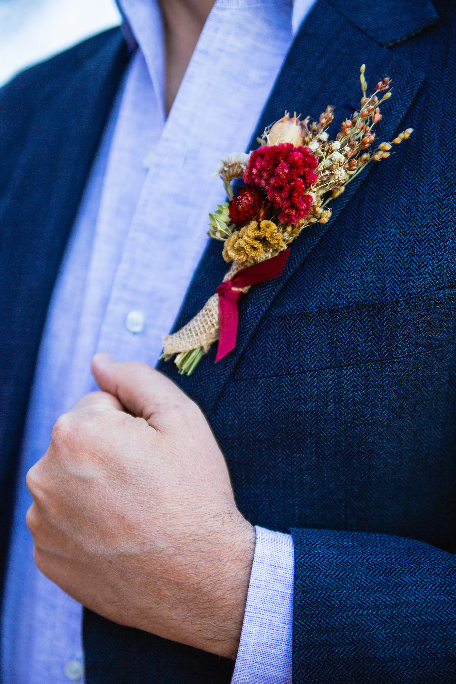 Groom's fall inspired dried flower boutonniere by PMA Photography.