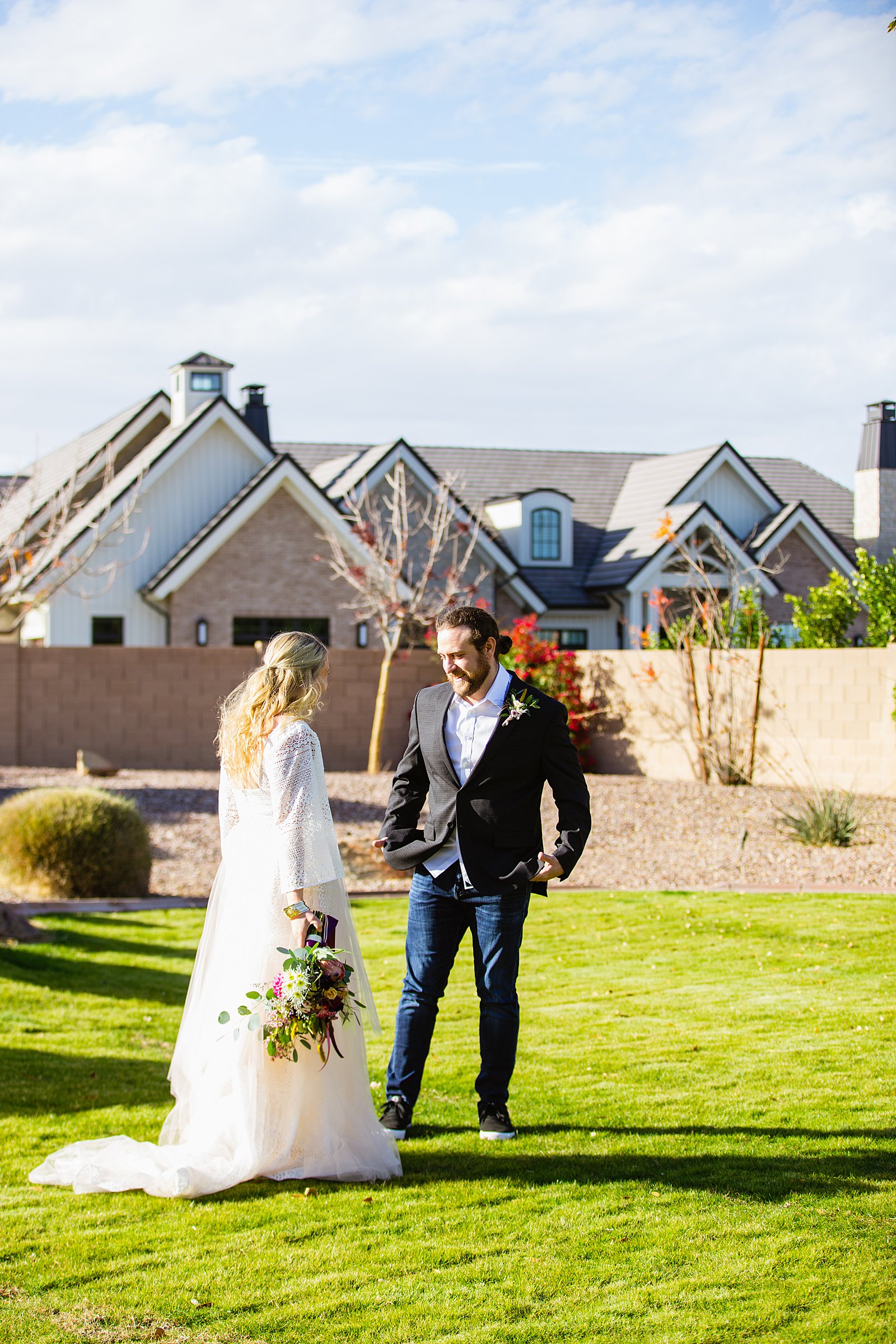 Bride and Groom's first look for their backyard wedding by Phoenix wedding photographer PMA Photography.