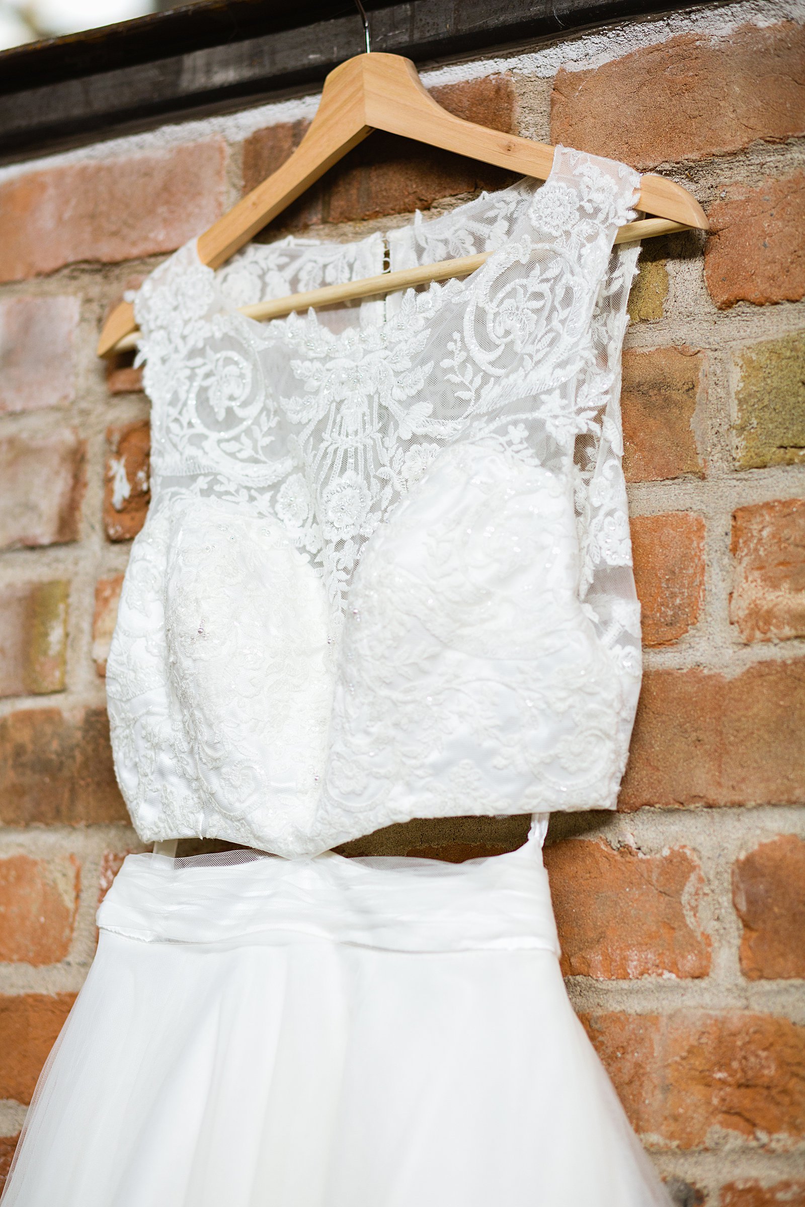 Bride's romantic crop top wedding dress for her Sunkist Warehouse wedding by PMA Photography.