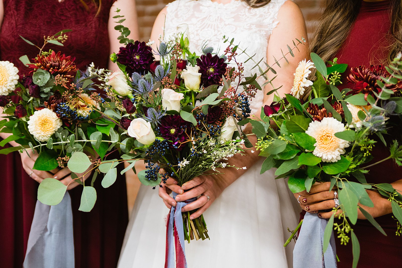Boho jewel toned inspired wedding bouquet by Mesa wedding photographer PMA Photography.