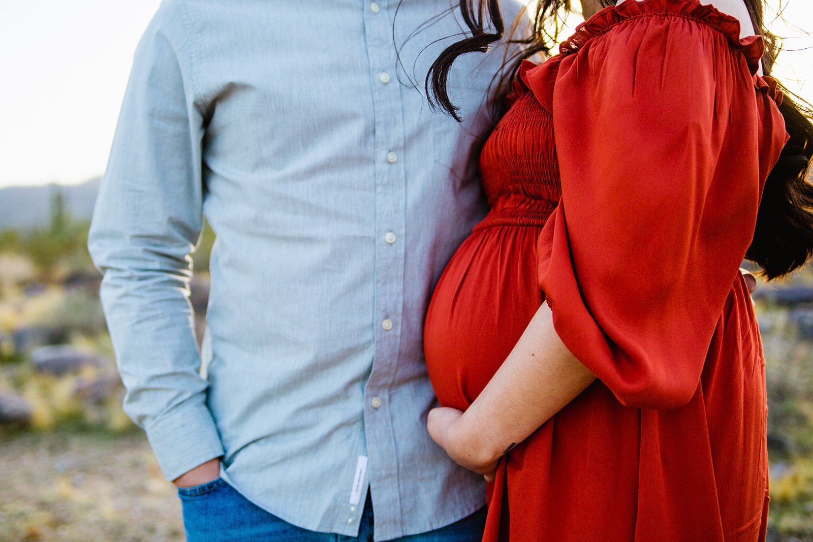 Close up image of baby bump during Phoenix maternity session by PMA Photography.