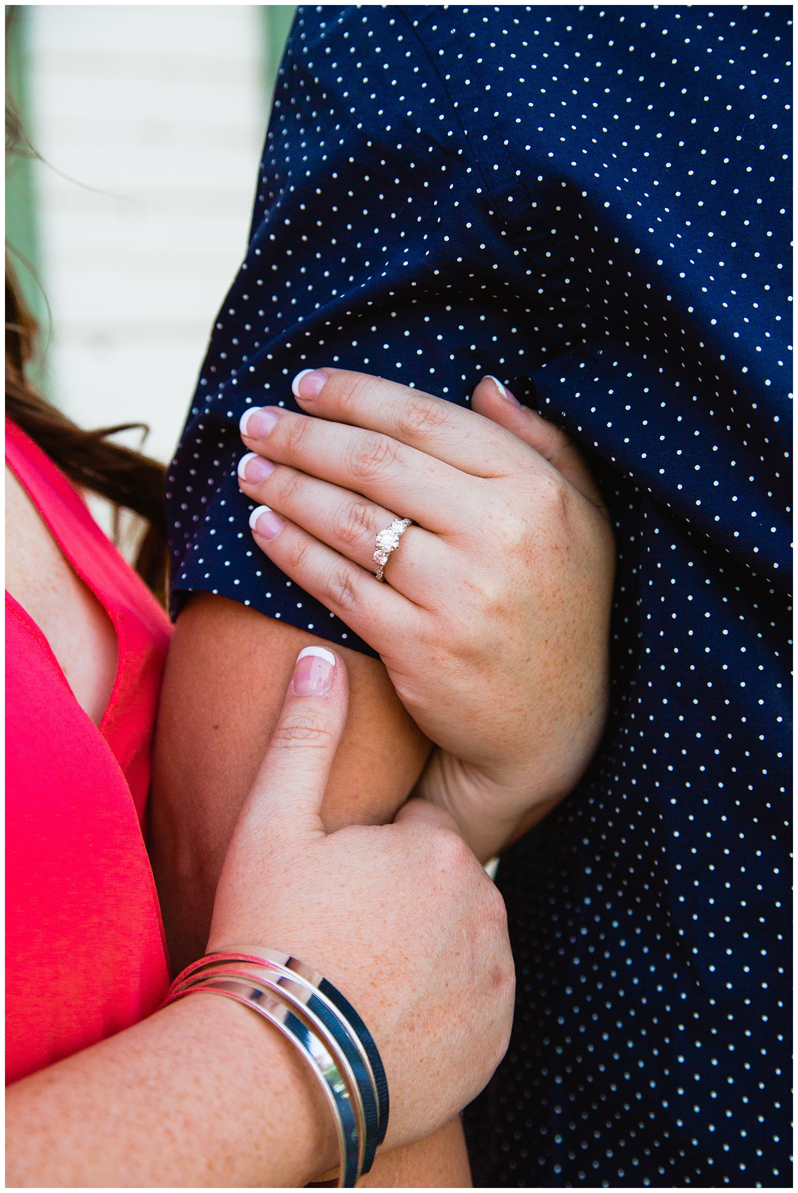 Detail image of couple's engagement session outfits by PMA Photography.