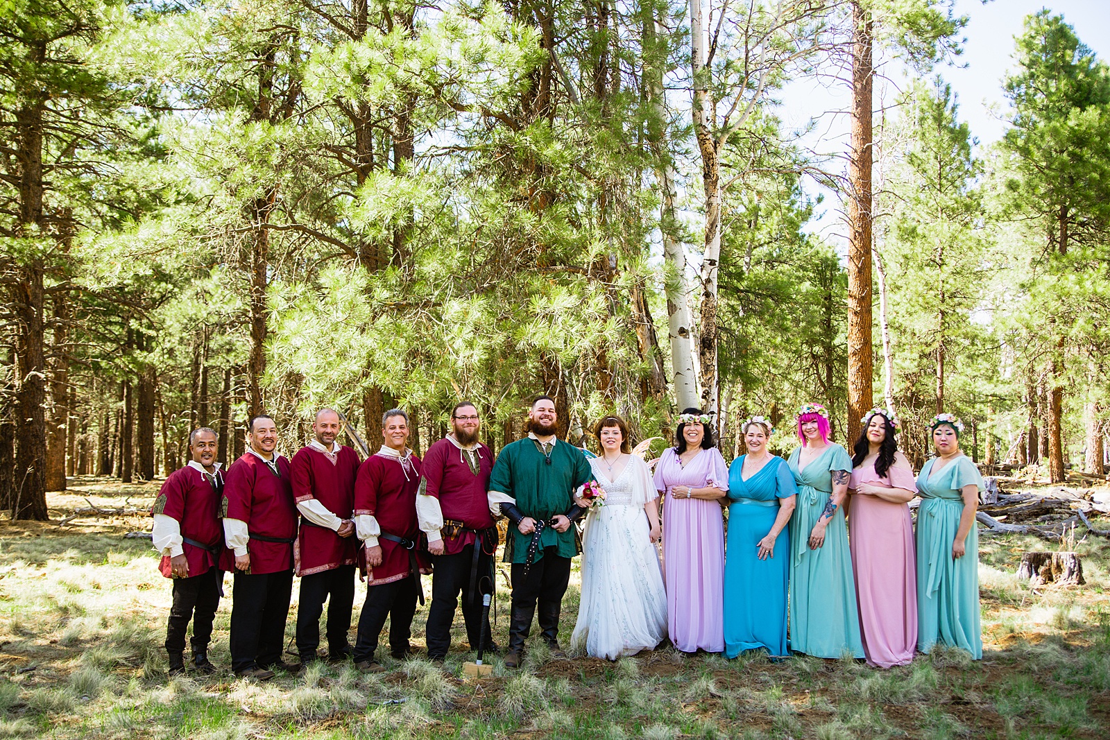 Renaissance inspired wedding party together at a Arizona Nordic Village wedding by Arizona wedding photographer PMA Photography.
