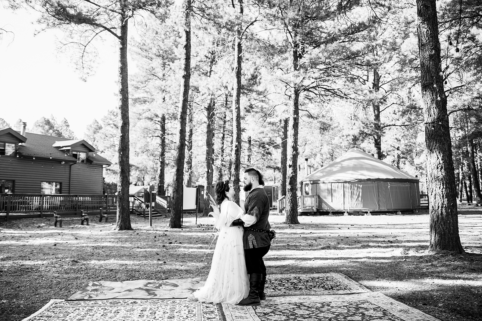 Newlyweds sharing first dance at their Arizona Nordic Village wedding reception by Arizona wedding photographer PMA Photography.