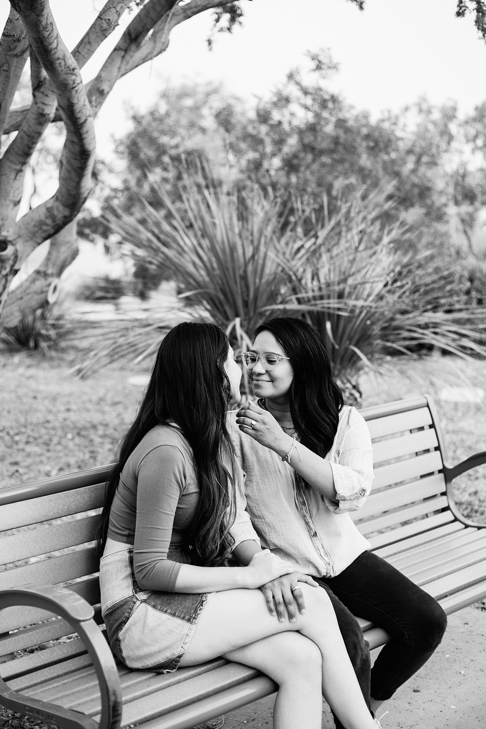 Same sex couple share an intimate moment at their Phoenix engagement session by Arizona engagement photographer PMA Photography.